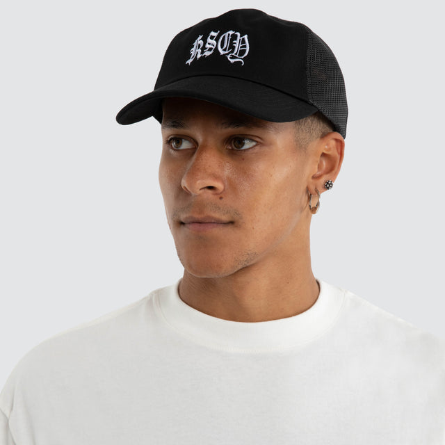 Model wears Scope Trucker Cap Jet Black Caps Black – image 5