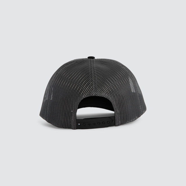 Model wears Hog Trucker Cap Charcoal/Black Caps Black – image 4