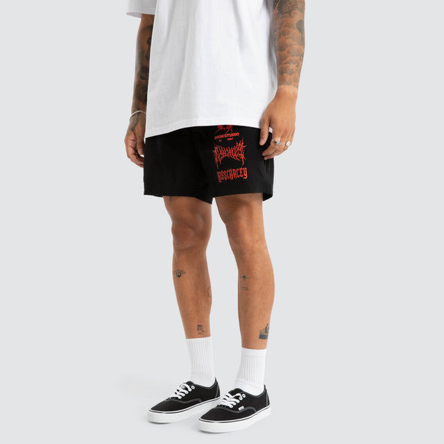 Model wears Doom Beach Short Jet Black Shorts Black – image 1