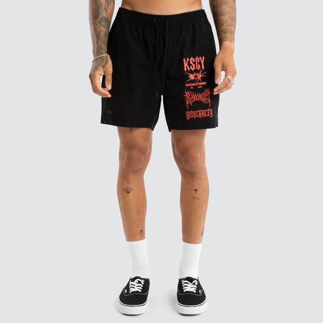 Model wears Doom Beach Short Jet Black Shorts Black – image 2