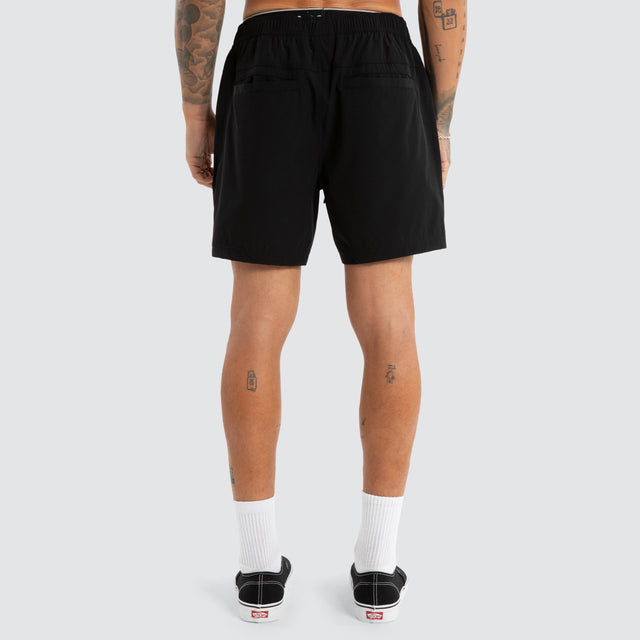 Model wears Doom Beach Short Jet Black Shorts Black – image 5
