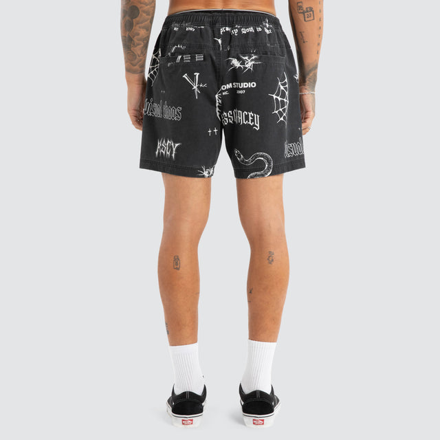Model wears Download Beach Short Black Print Shorts Black – image 3