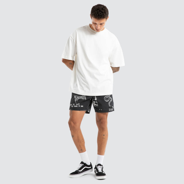 Model wears Download Beach Short Black Print Shorts Black – image 5