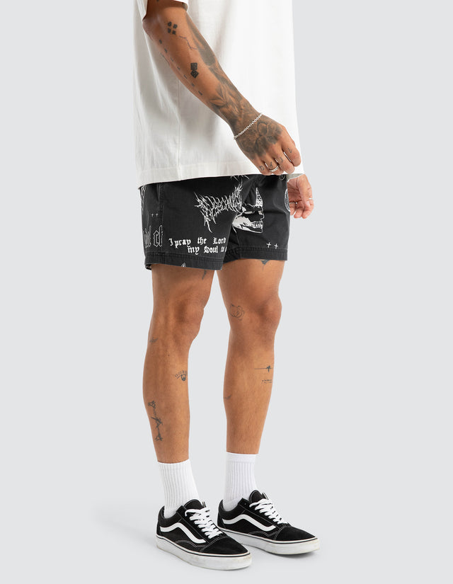 Model wears Download Beach Short Black Print Shorts Black – image 6