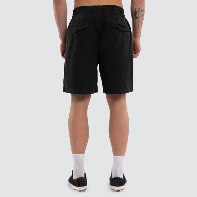 Model wears Anti Social Casual Walk Short Jet Black Shorts Black – image 2
