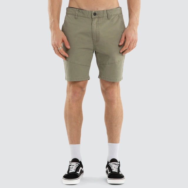 Model wears Wyvern Short Army Shorts Brown – image 1