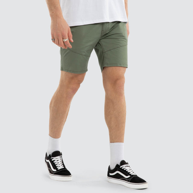 Model wears Wyvern Short Khaki Shorts Green – image 4