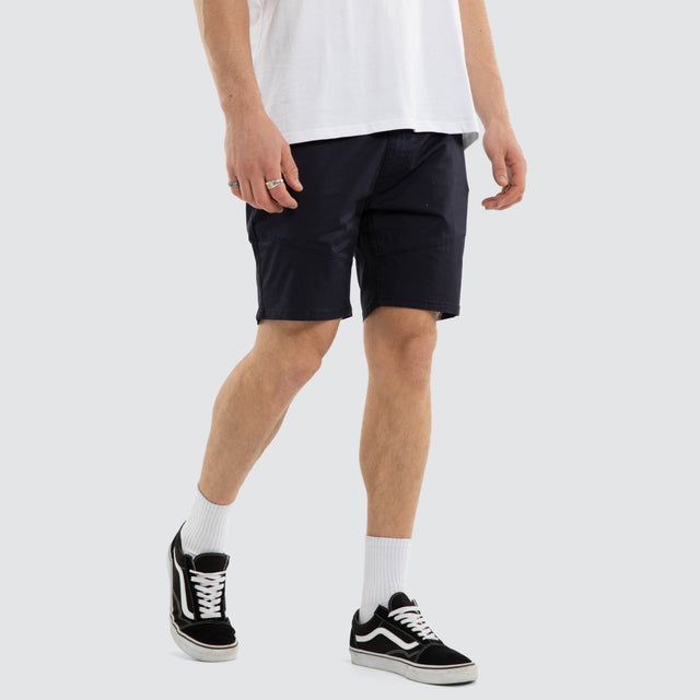 Model wears Wyvern Short Navy Shorts Navy – image 4