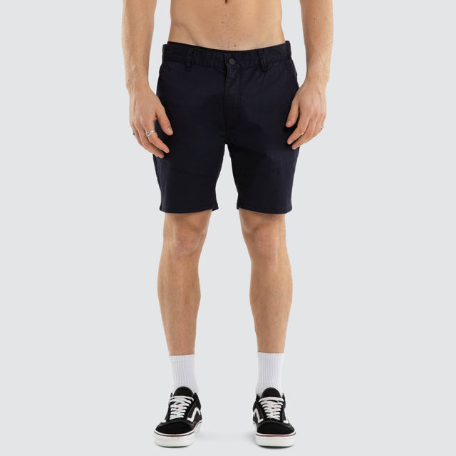 Model wears Wyvern Short Navy Shorts Navy – image 1