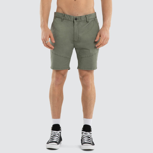 Model wears Wyvern Short Oil Green Shorts Green – image 1