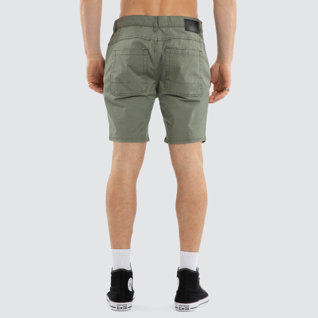 Model wears Wyvern Short Oil Green Shorts Green – image 5