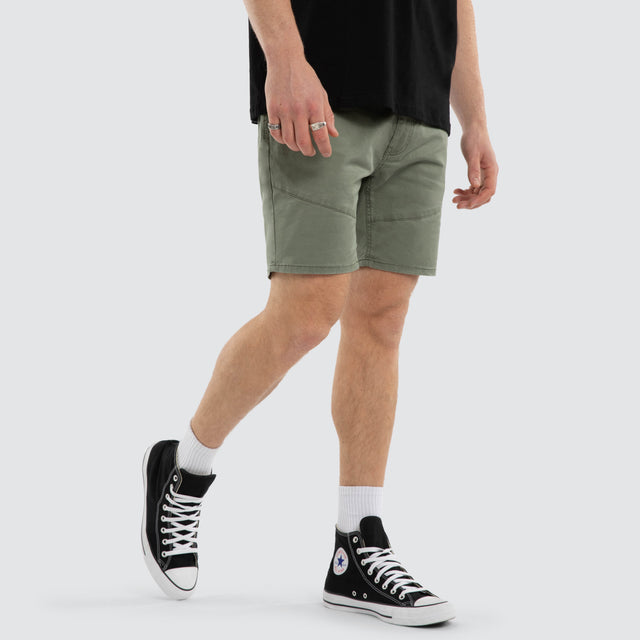 Model wears Wyvern Short Olive Shorts Green – image 4