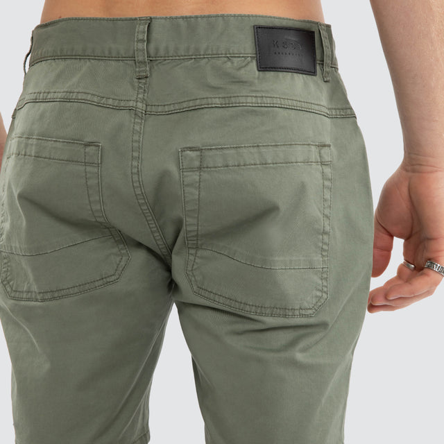 Model wears Wyvern Short Olive Shorts Green – image 6