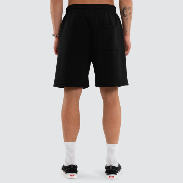 Model wears Threshold Trackshort Jet Black Trackshorts Black – image 5