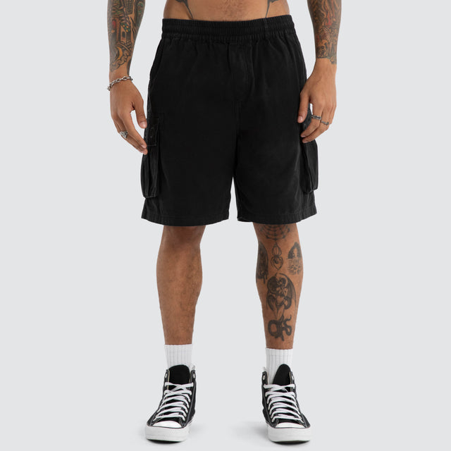 Model wears Mosh Baggy Cargo Short 2.0 Jet Black Shorts Black – image 2