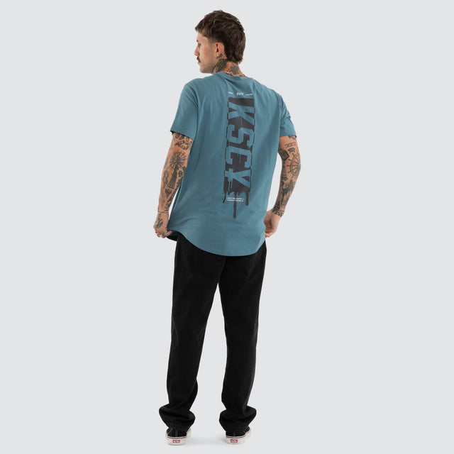Model wears Dream Dual Curved Tee Aegean Blue T-Shirts Blue – image 2