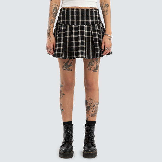 Model wears Tempest Pleated Skirt Black/White Check Skirt Black – image 3