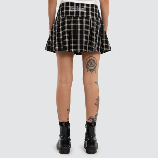 Model wears Tempest Pleated Skirt Black/White Check Skirt Black – image 2