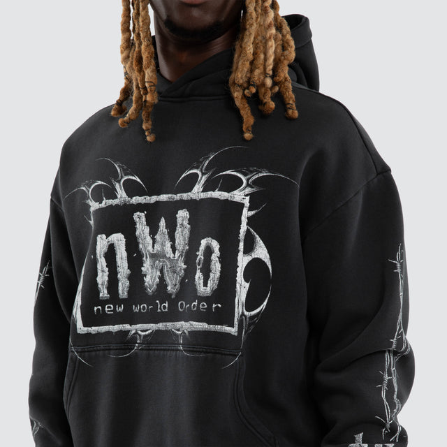 Model wears NWO 4 Life Oversized Hoodie Pigment Anthracite Black Hoodies Black – image 4