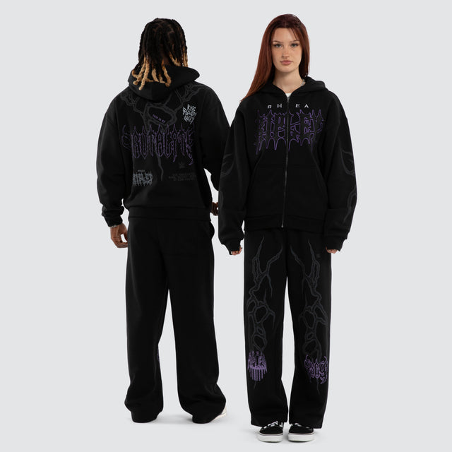 Model wears Rhea Ripley Chaos Street Zip Hoodie Anthracite Black Hoodies Black – image 5