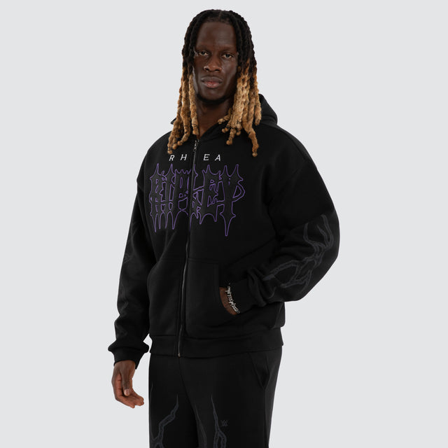 Model wears Rhea Ripley Chaos Street Zip Hoodie Anthracite Black Hoodies Black – image 3