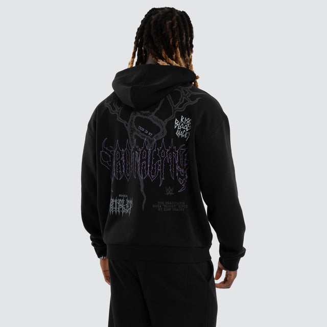 Model wears Rhea Ripley Chaos Street Zip Hoodie Anthracite Black Hoodies Black – image 6