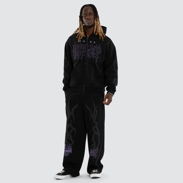 Model wears Rhea Ripley Chaos Razor Trackpant Anthracite Black Trackpants Black – image 5
