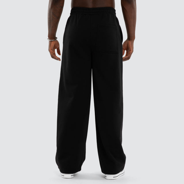 Model wears Rhea Ripley Chaos Razor Trackpant Anthracite Black Trackpants Black – image 3