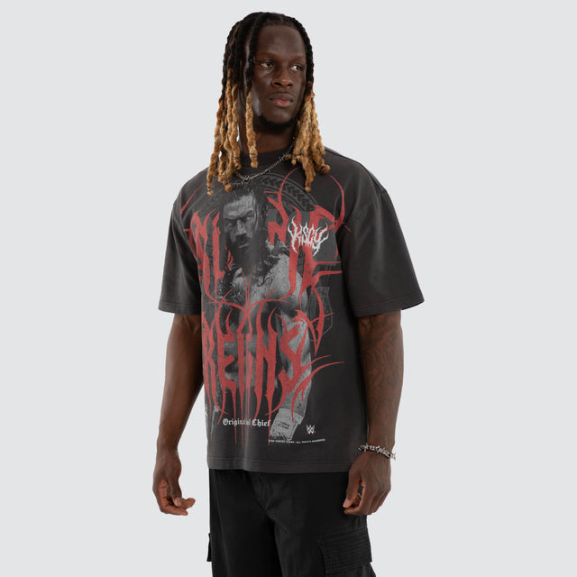 Model wears Roman Reigns Tribal Street Tee Pigment Jet Black T-Shirts Black – image 3