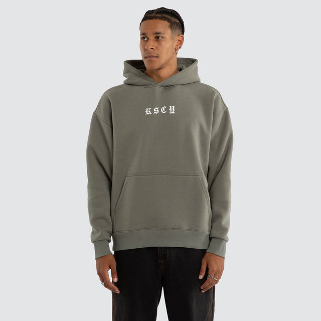Model wears Marked Oversize Hoodie Basil Hoodies Green – image 1