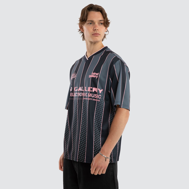 Model wears Metro Strike Football Jersey Black Stripe Jerseys Black – image 3