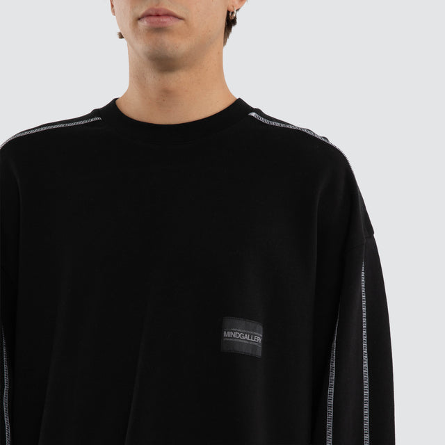 Model wears Night Loopback Panel LS Tee Jet Black Longsleeve T-Shirts Black – image 4