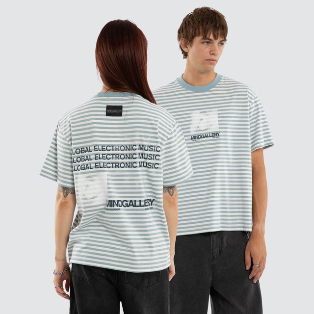 Model wears Manor Rocker Tee Nat White/ Arona Teal Stripe T-Shirts Blue – image 1