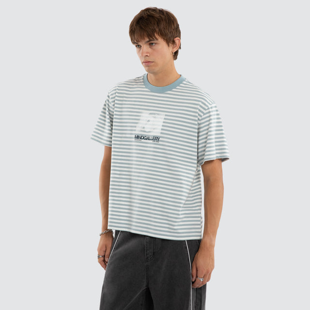 Model wears Manor Rocker Tee Nat White/ Arona Teal Stripe T-Shirts Blue – image 4