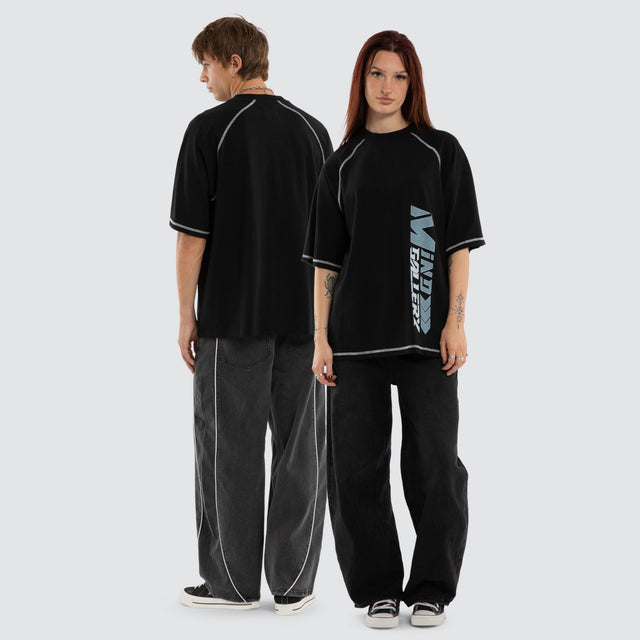 Model wears Step Raglan Raptor Tee Jet Black T-Shirts Black – image 5