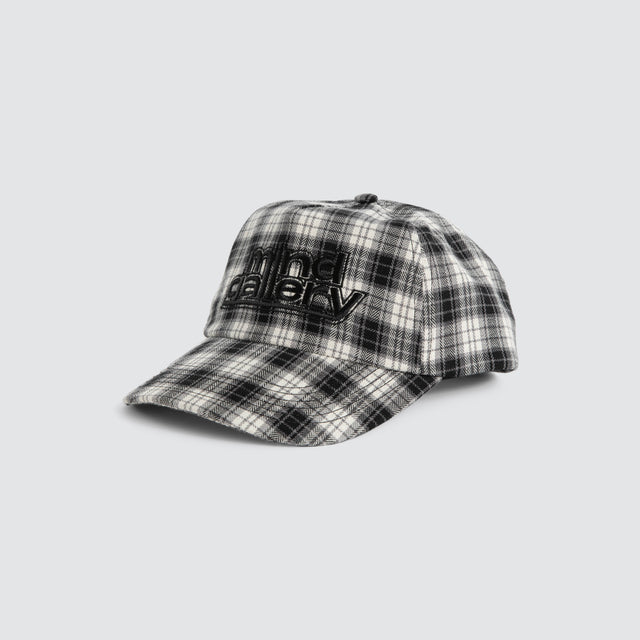Model wears Dunne Cap Black Check Mind Gallery Black – image 1