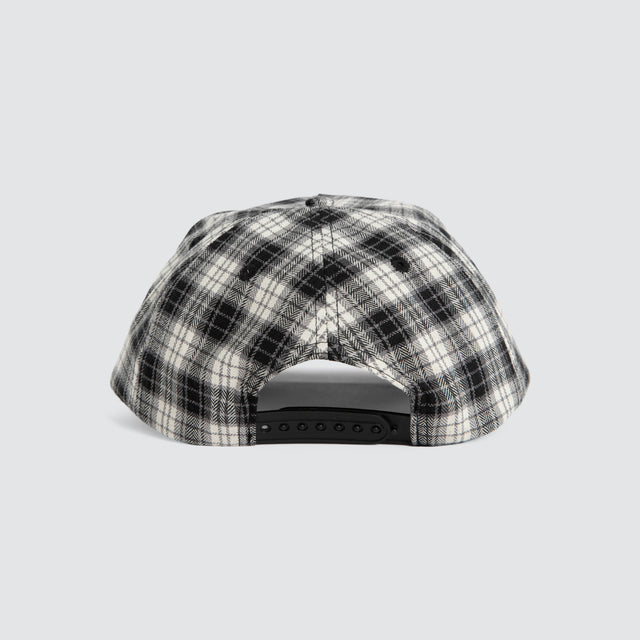 Model wears Dunne Cap Black Check Mind Gallery Black – image 4