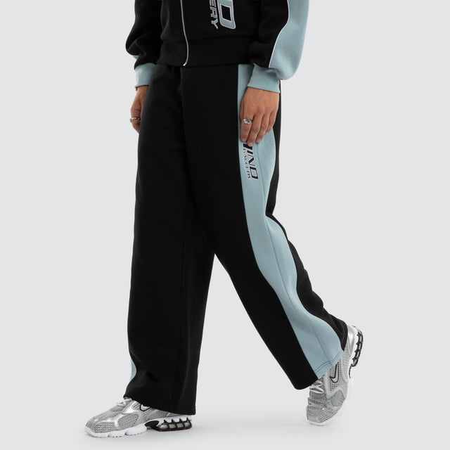 Model wears Grey Cloud Trackpants Jet Black/Arona Teal Trackpants Blue – image 3