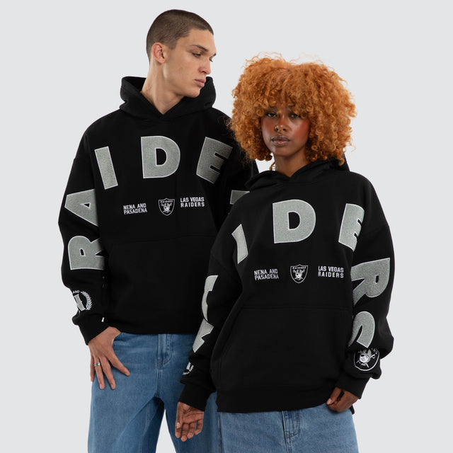 Model wears Las Vegas Raiders NFL Arch Hoodie Jet Black Hoodies Black – image 1