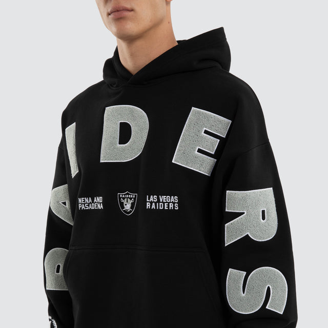 Model wears Las Vegas Raiders NFL Arch Hoodie Jet Black Hoodies Black – image 4