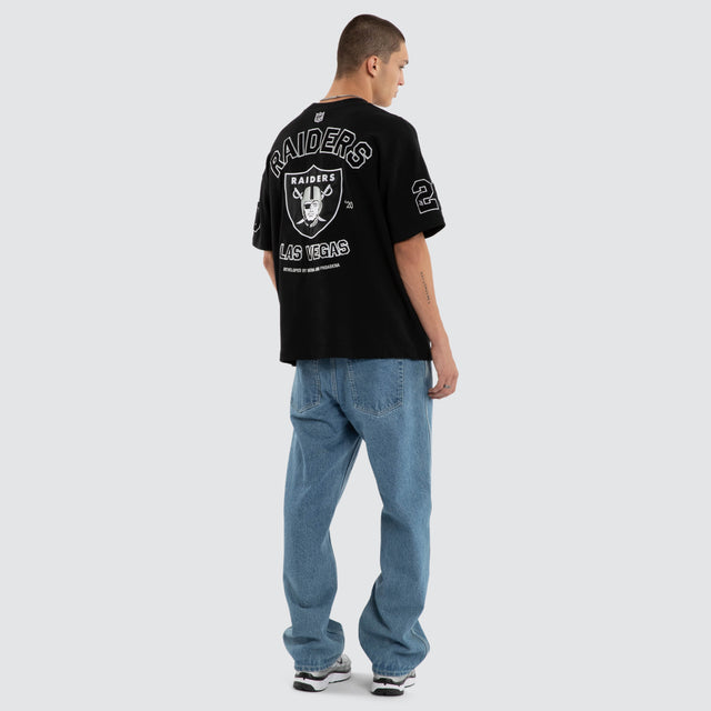 Model wears Las Vegas Raiders NFL Founded Loopback Tee Jet Black T-Shirts Black – image 2