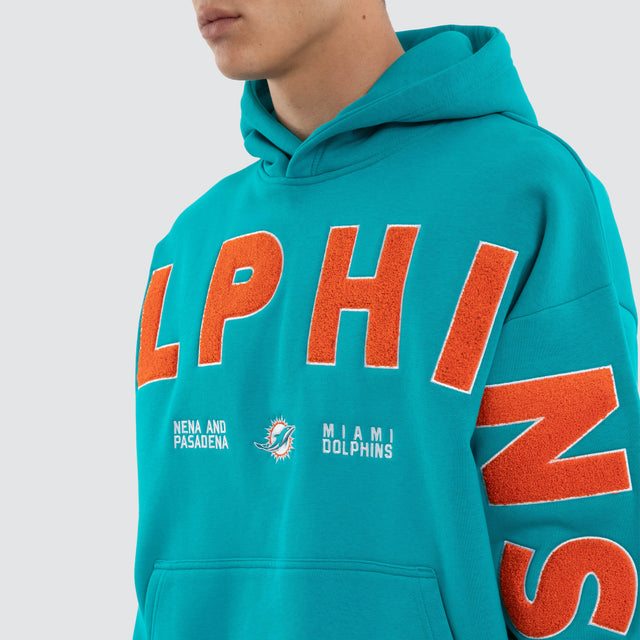 Model wears Miami Dolphins NFL Arch Hoodie Aqua Hoodies Green – image 5