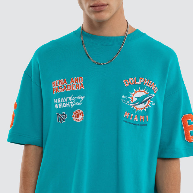 Model wears Miami Dolphins NFL Founded Loopback Tee Aqua T-Shirts Blue – image 5