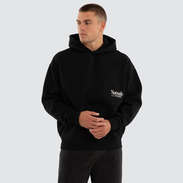 Model wears Retreat Oversized Hoodie Jet Black Hoodies Black – image 1