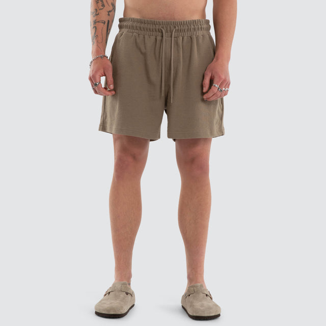 Model wears Matteo 6 Inch Daily Short Olive Shorts Green – image 5