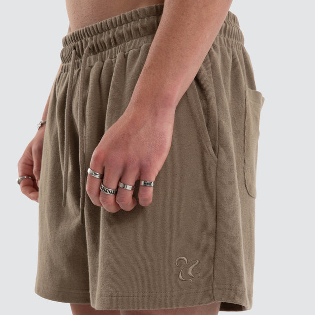 Model wears Matteo 6 Inch Daily Short Olive Shorts Green – image 3