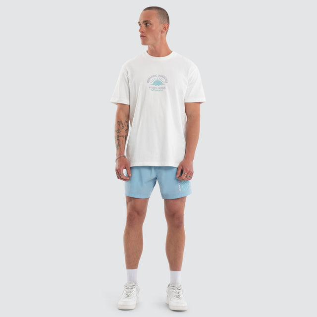 Model wears Coral 6 Inch Swim Short Baby Blue Shorts Blue – image 5