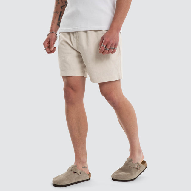 Model wears Coastal Linen Short Oatmeal Shorts Cream – image 1