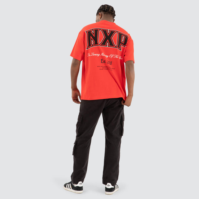 model wears Knockout Raptor Tee Poppy Red T-Shirts Red - image 4