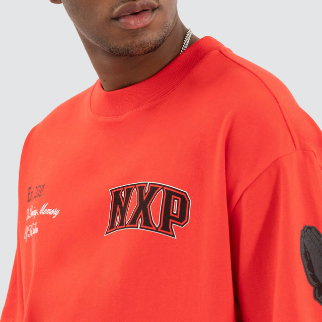 model wears Knockout Raptor Tee Poppy Red T-Shirts Red - image 5